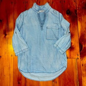 Longer denim shirt.